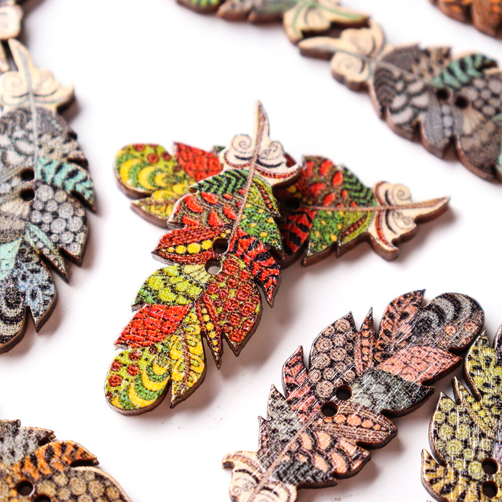 
	50 Pcs Feather Shape Natural Wood Sewing Buttons Fastness DIY Wooden Buttons Handcraft Material